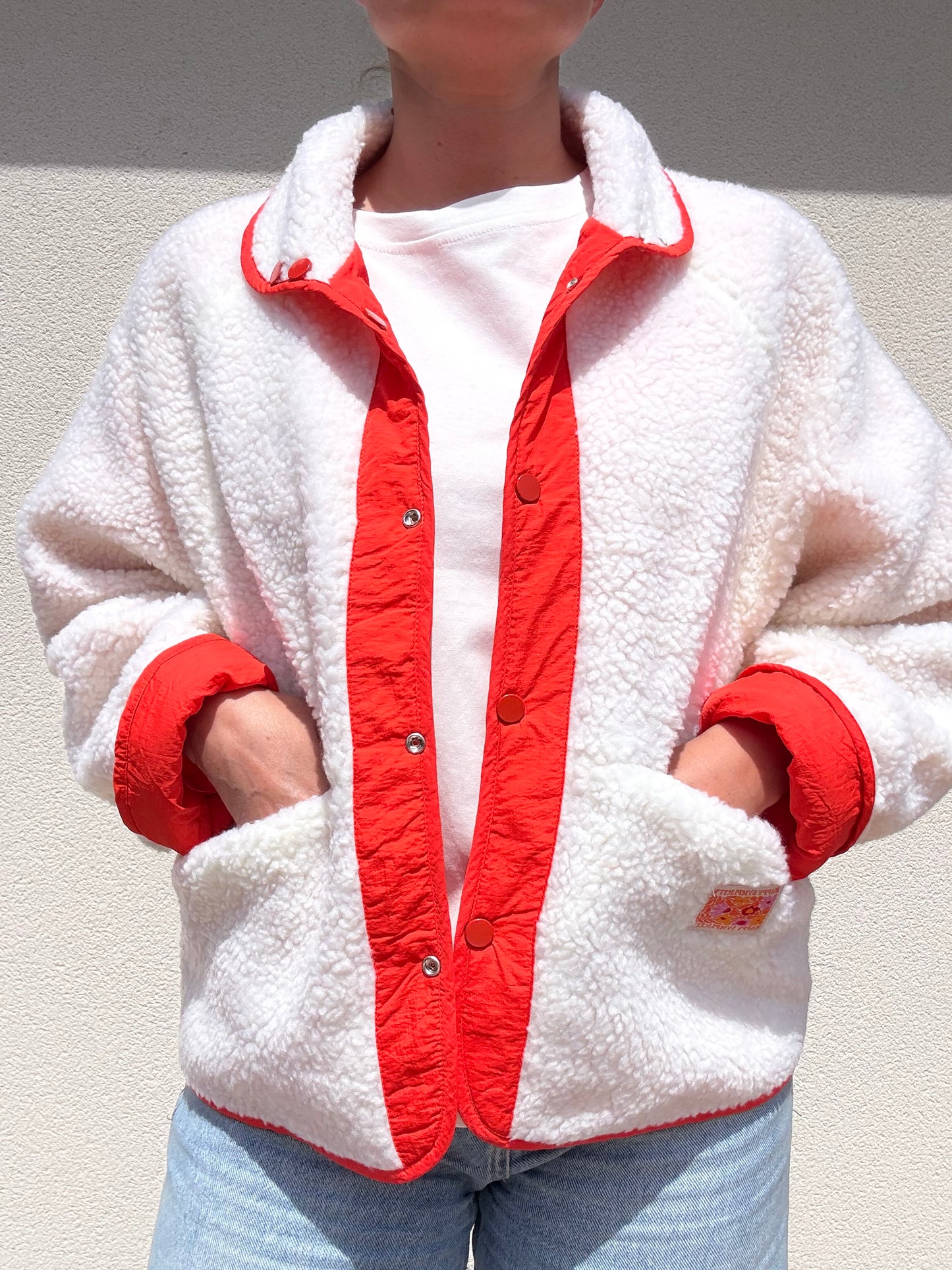 VESTE REVERSIBLE CORAIL